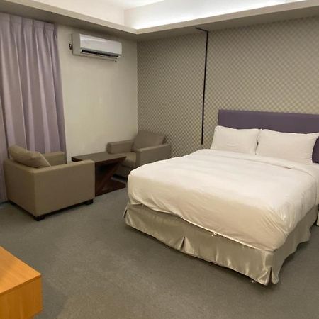 Aiyue Hotel Huwei Buitenkant foto