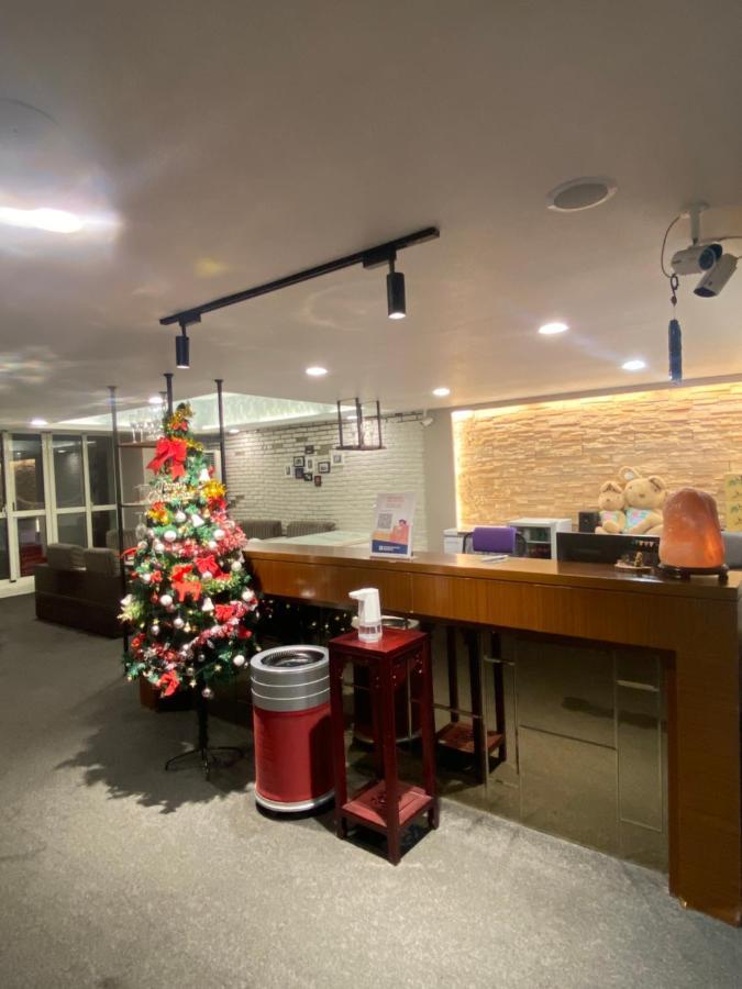 Aiyue Hotel Huwei Buitenkant foto